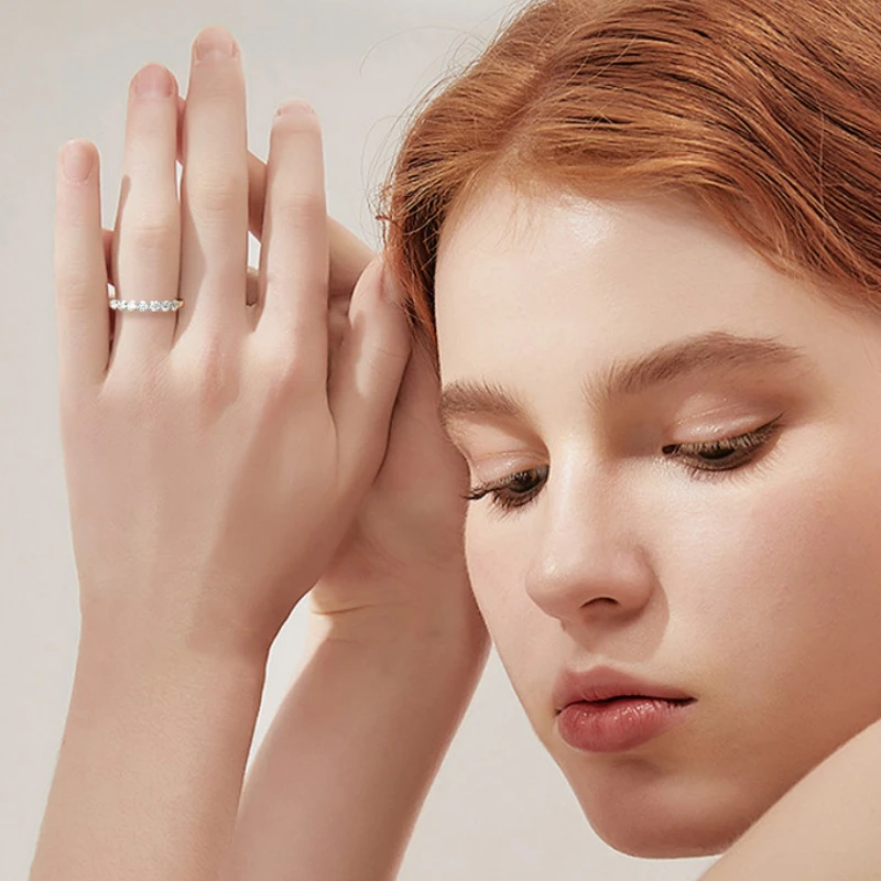 Elegant 925 sterling silver ring for women with seven sparkling moissanite stones by Mireli Jewelry
