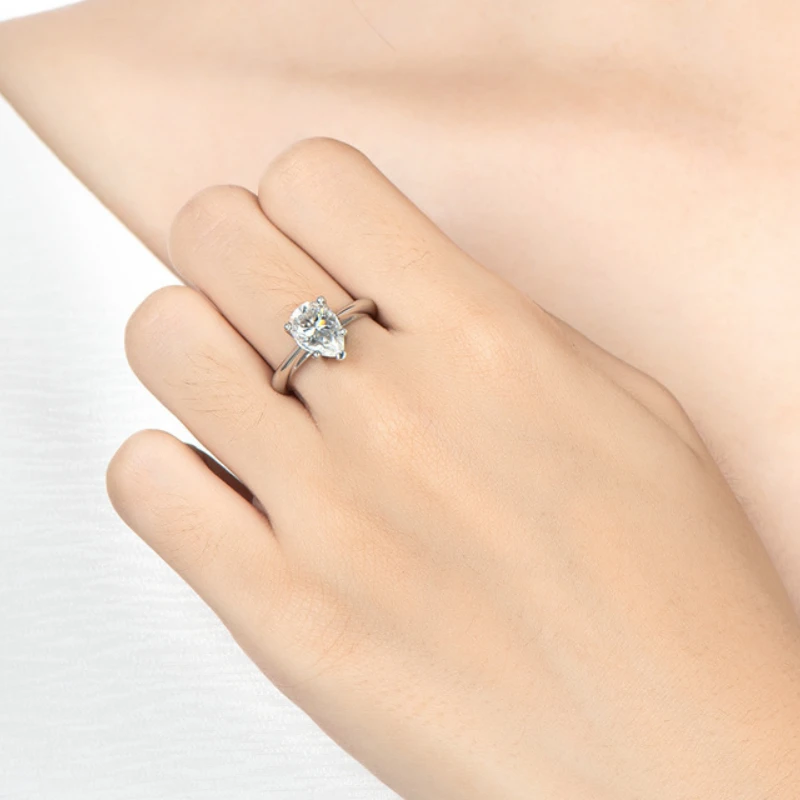 Classic 2 carat pear cut moissanite ring in 925 sterling silver – elegant diamond alternative by Mireli Jewelry