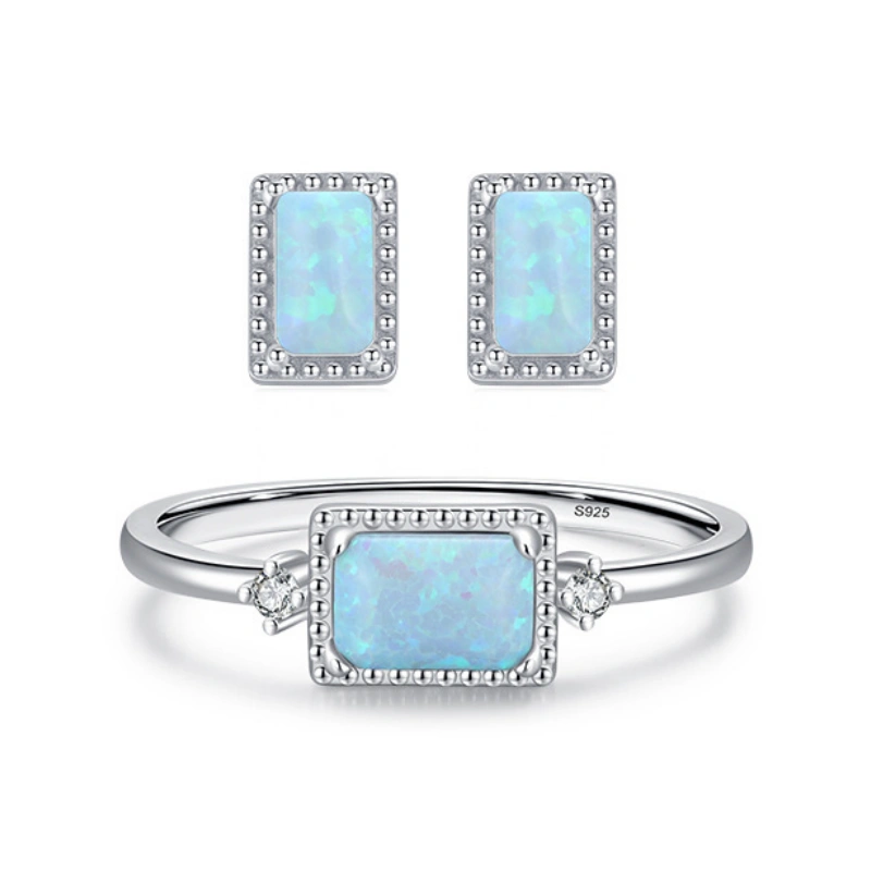 Rectangular blue fire opal ring and matching stud earrings set in 925 sterling silver, minimalist design for women