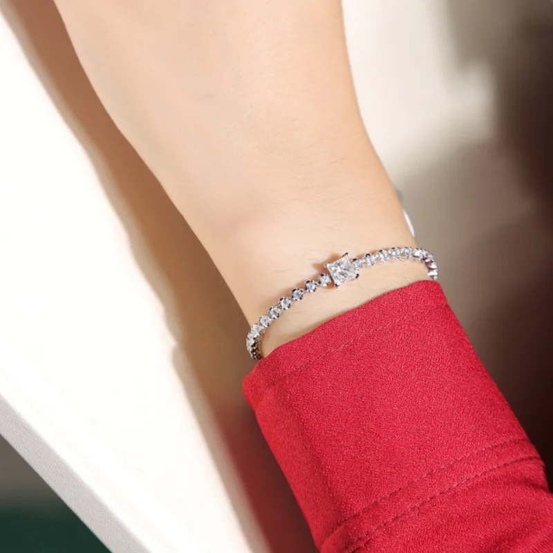Elegant Celestia bracelet with princess-cut moissanite in 925 sterling silver – luxury tennis jewelry gift for women and couples, available online