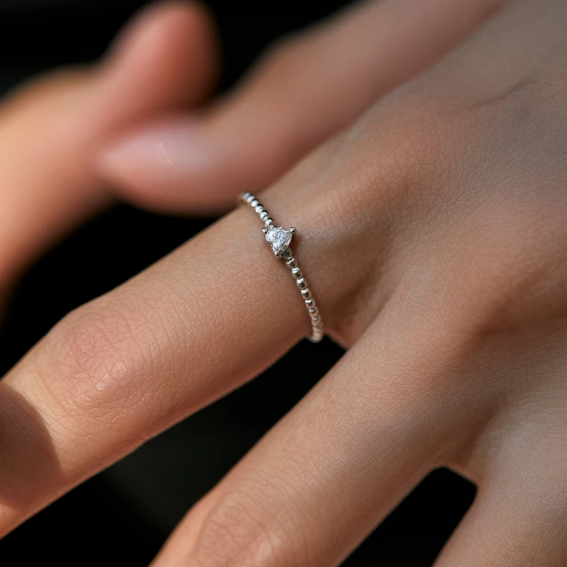 Minimalist heart-shaped moissanite promise ring with beaded 925 sterling silver band – dainty romantic design by Mireli Jewelry